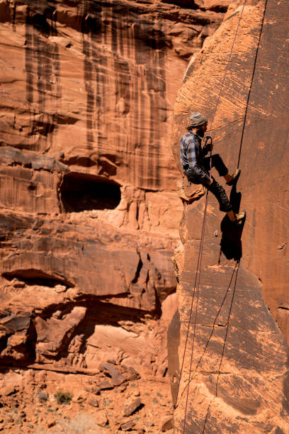 istock Young Man Mountain Climber in Moab 949565858