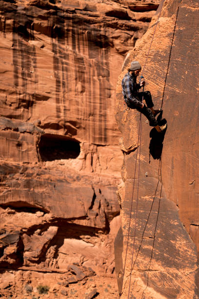 istock Young Man Mountain Climber in Moab 949565864