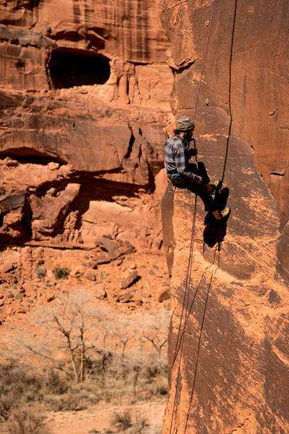 istock Young Man Mountain Climber in Moab 949565872