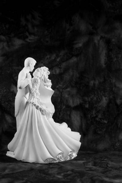 istock bride and groom dancing figurine 949577754