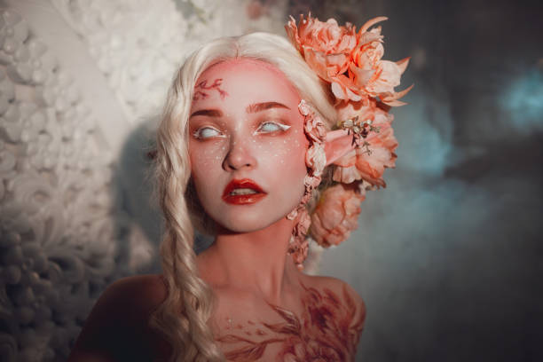 istock Young beautiful girl elf. Creative make-up and bodyart 949589668