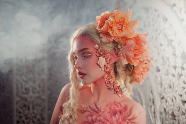 istock Young beautiful girl elf. Creative make-up and bodyart 949593284