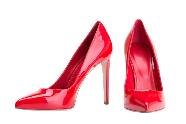 Red female shoes on a white background Red women's high-heeled shoes high heels stock pictures, royalty-free photos & images