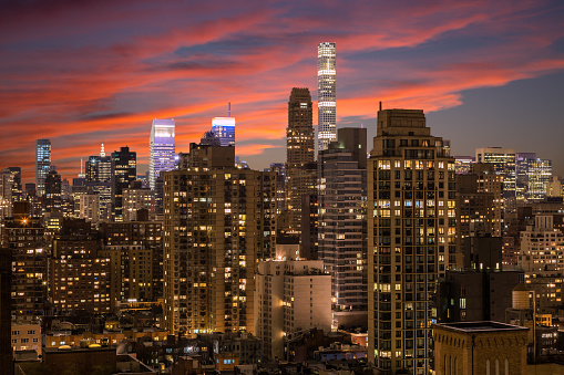 New York Skyline with Manhattan Upper East Side and Midtown Luxury Condominium Highrises, Small Footprint Tall Towers and Sunset Sky.