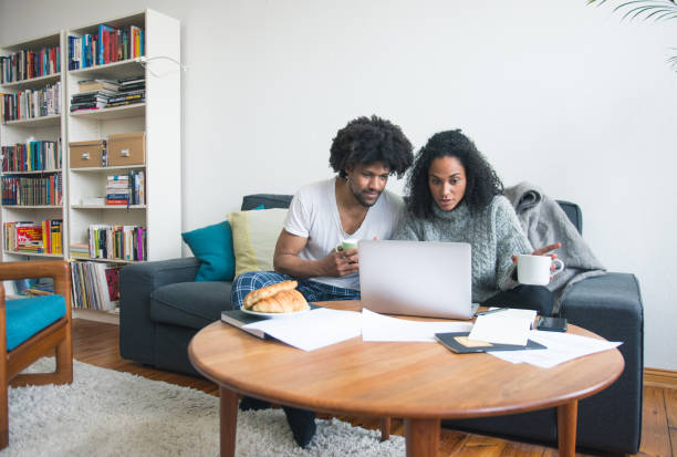 istock Couple working together in the morning on the sofa 949608450