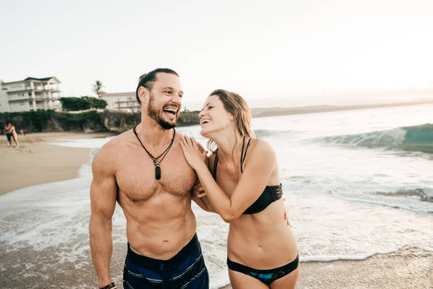 istock A beautiful couple in their beach attire 949610982
