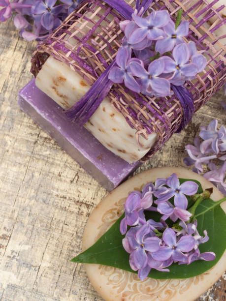 istock cosmetic with lilac flowers 949611440
