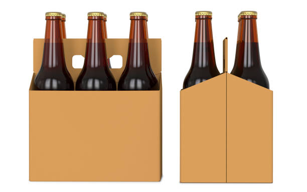 istock Six brown beer bottles in cardboard boxk. Side view and front view. 3D render, isolated on white background. 949611630