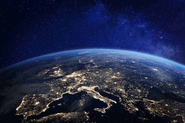 Europe at night from space, city lights, elements from NASA Europe at night viewed from space with city lights showing human activity in Germany, France, Spain, Italy and other countries, 3d rendering of planet Earth, elements from NASA (https://eoimages.gsfc.nasa.gov/images/imagerecords/55000/55167/earth_lights_lrg.jpg) planet space stock pictures, royalty-free photos & images