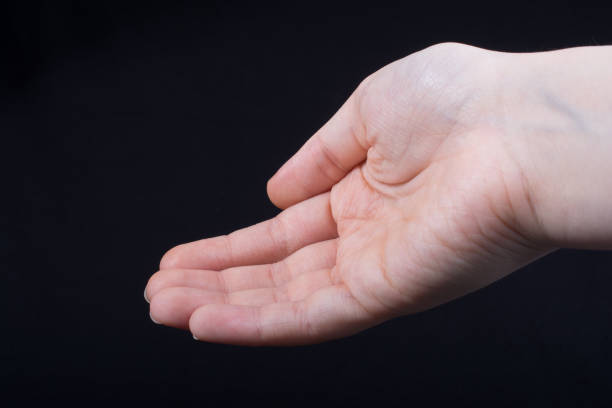 istock Five  fingers of a human hand partly seen in view 949627098