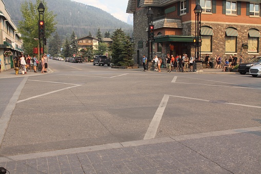A busy six way pedestrian intersection in Banff Canada a very touristy town