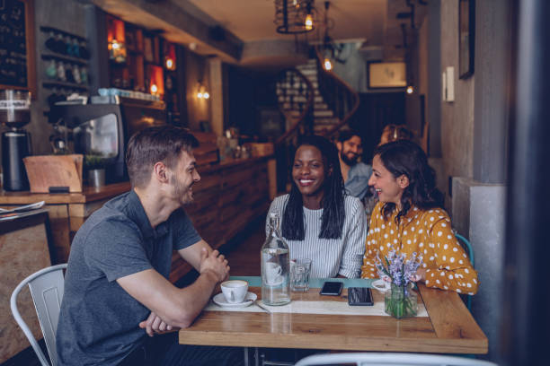 istock Group of young friends at coffee shop 949652214