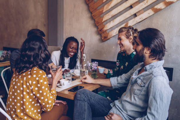 istock Group of friends drinking coffee 949652548