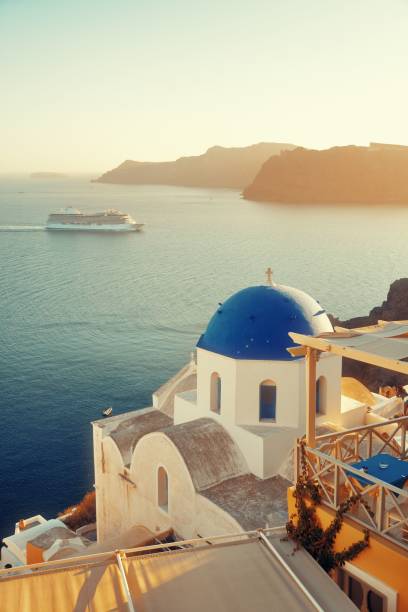 istock Santorini skyline blue church 949660402