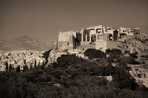 Acropolis historical ruins on top of mountain in Athens, Greece.