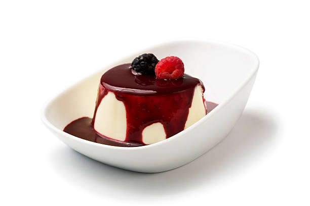 istock Panna Cotta with a berry fruit sauce in a white bowl 94967882