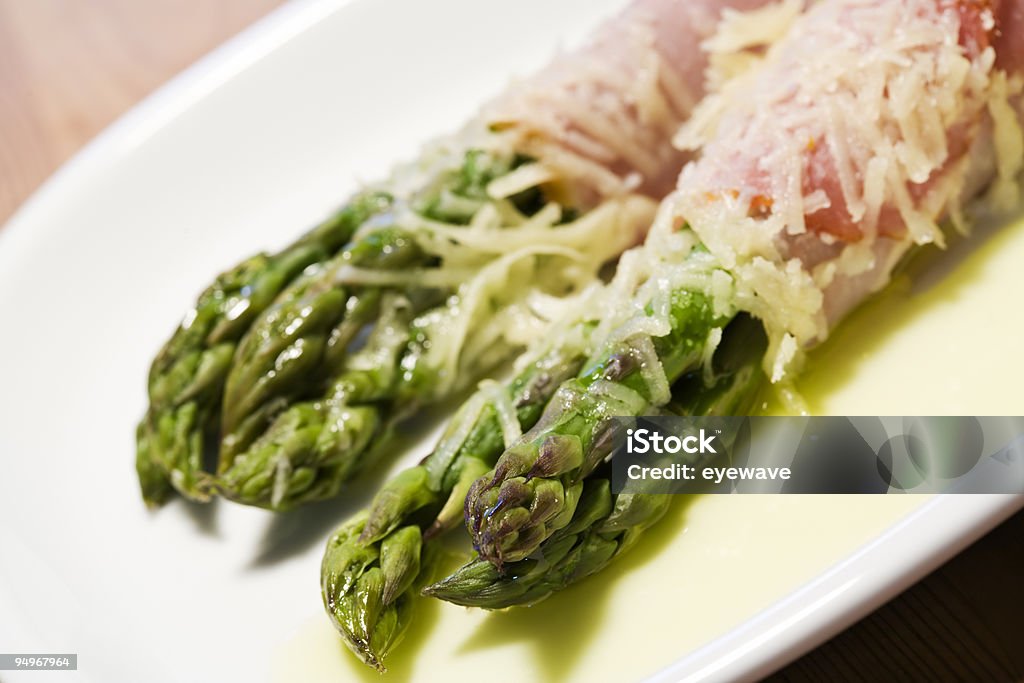 green asparagus wrapped in ham  Asparagus Stock Photo