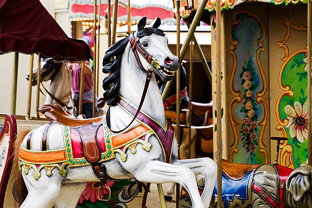 istock horse ride carousel at fairground 94968856