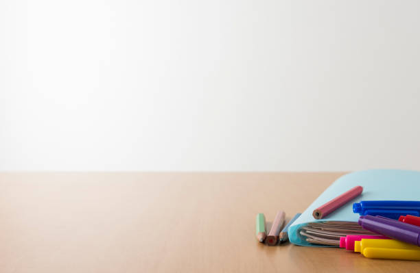 File and writing instrument on desk table.Focus in front. With copy space.