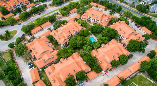 istock Orange townhomes apartment buildings surrounding new development suburb 949704014