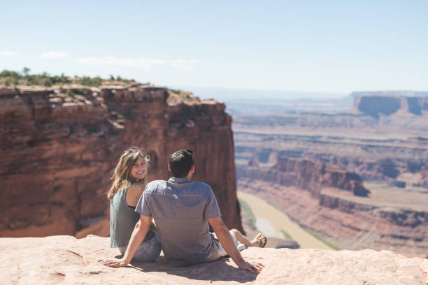 istock A young couple on a day hike in the Utah desert 949707300