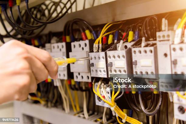 Electrician Measurements With Multimeter Tester System Ready Stock Photo - Download Image Now