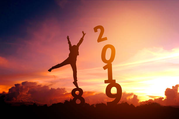 istock Silhouette young man Happy for 2019 new year 949714554