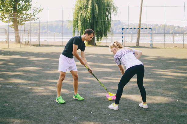 couple doing sporty activities together stock photo