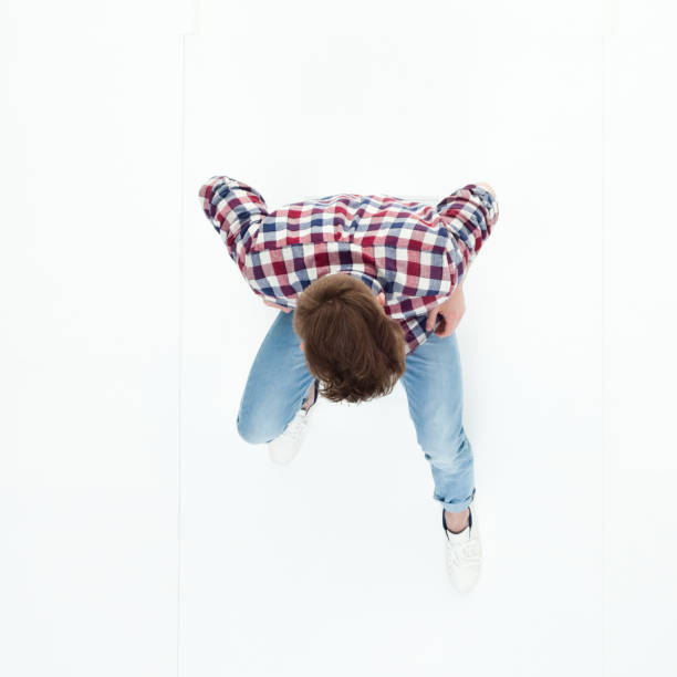 istock Top down view of young man sitting 949736804