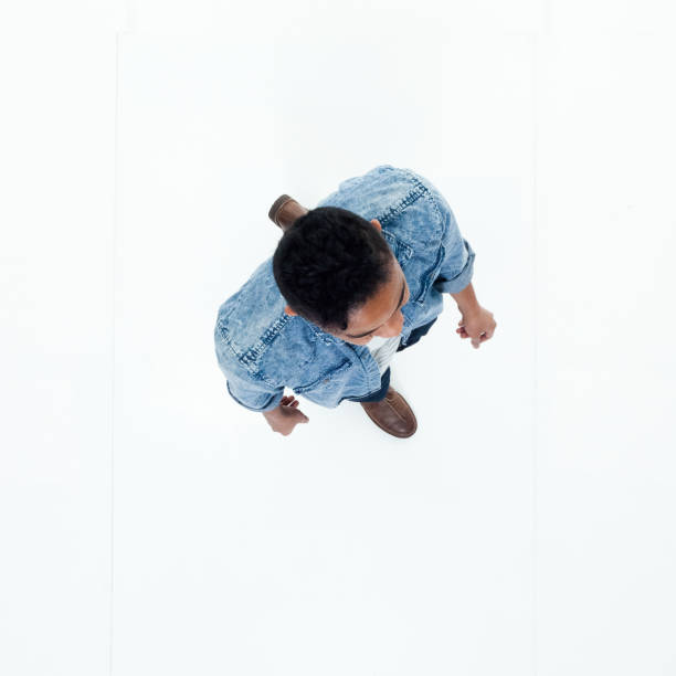 istock Top view of African American man walking 949737070