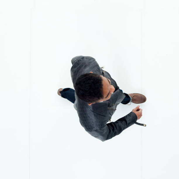 istock Directly above view of African American man walking 949737090