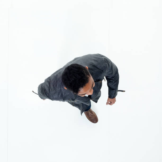 istock Directly above view of African American man walking 949737092