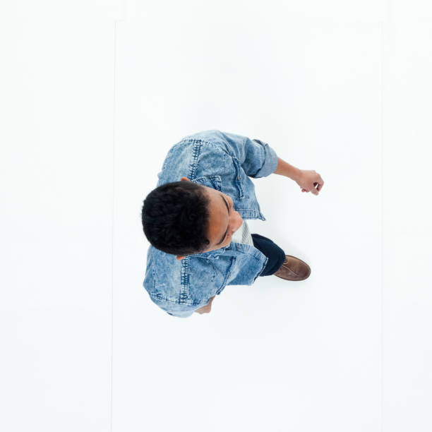 istock Top view of African American man walking 949737190