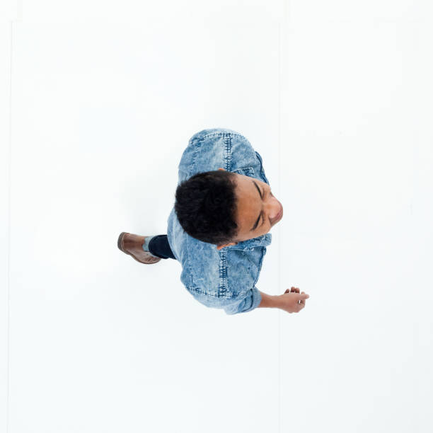 istock Top view of African American man walking 949737206