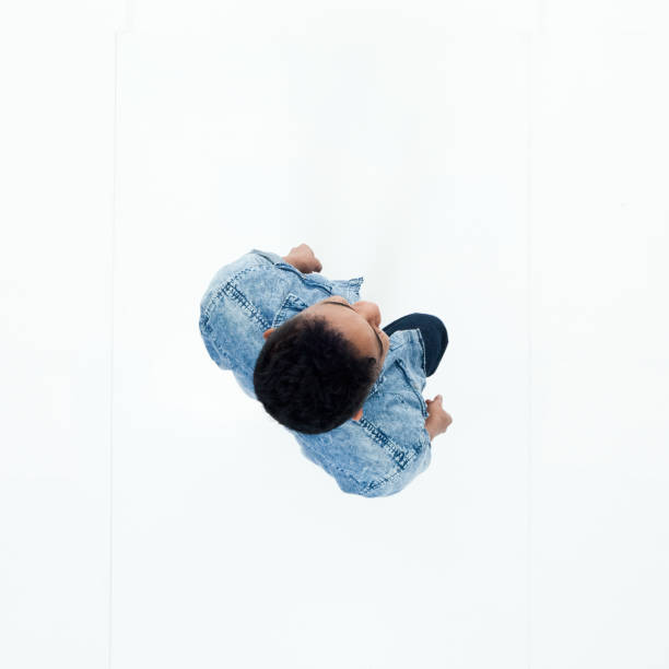 istock Top view of African American man walking 949737334
