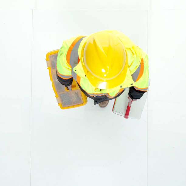 istock Directly above view of construction worker walking 949737420