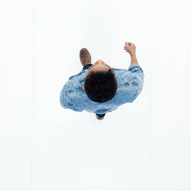 istock Top view of African American man walking 949737432