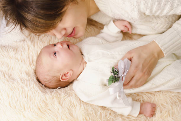 istock Mother and newborn daughter 949739584