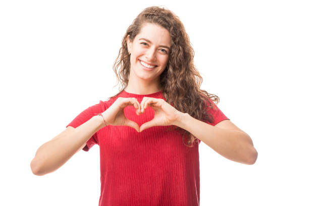 istock Beautiful young woman in love 949739924