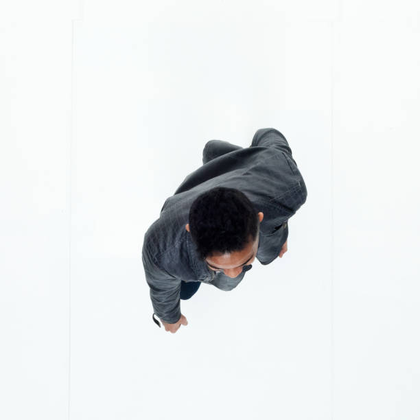 istock Directly above view of African American man pointing 949740110