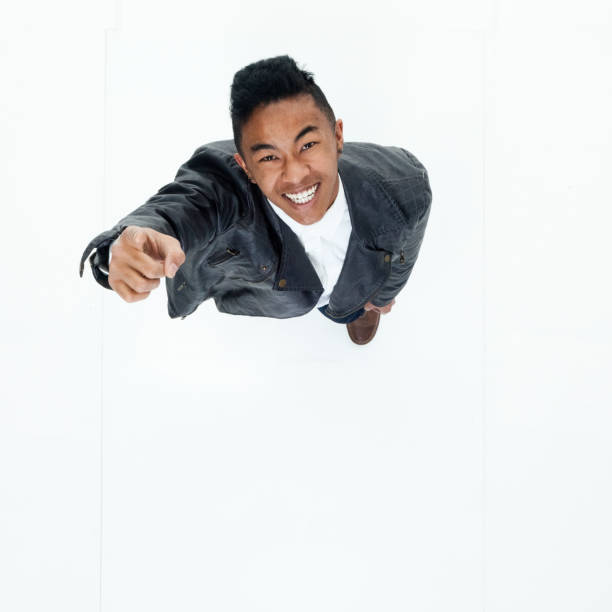 istock Directly above view of African American man pointing 949740306