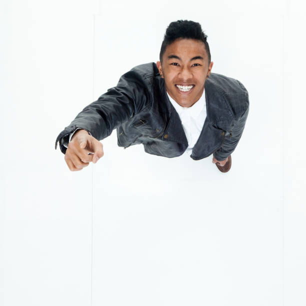 istock Directly above view of African American man pointing 949740362