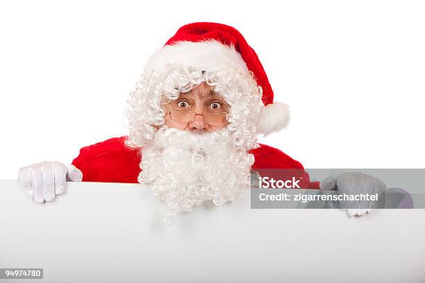 Photo libre de droit de Surprise De Père Noël Avec Noël Advertisment Panneau banque d'images et plus d'images libres de droit de Adulte