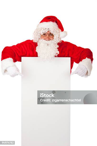 Santa Claus Punktów Palcami Na Special Christmas Advertisment Znak - zdjęcia stockowe i więcej obrazów Aktywni seniorzy