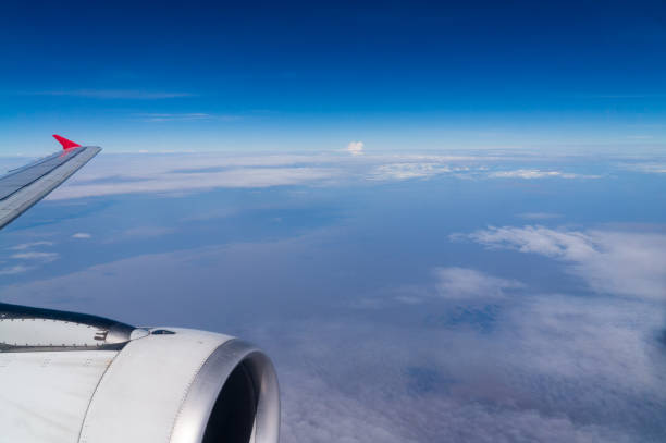 istock View of jet engine and end of the airplane wing 949753936