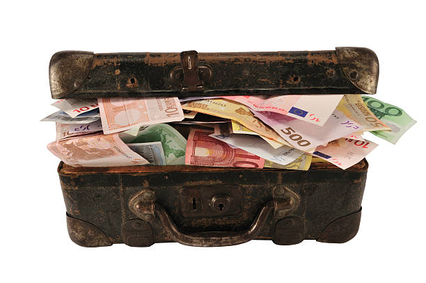 istock Suitcase full of money 94975485