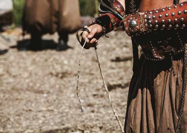 istock Hands of ancient warrior holding  mace 949756296