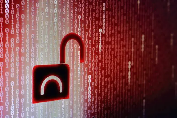 Photo of data breach concept. internet compute privacy compromised. unsecured network and data transfer. hacker hacked in to the system. cyber crime. Red binary code background with open black padlock icon.