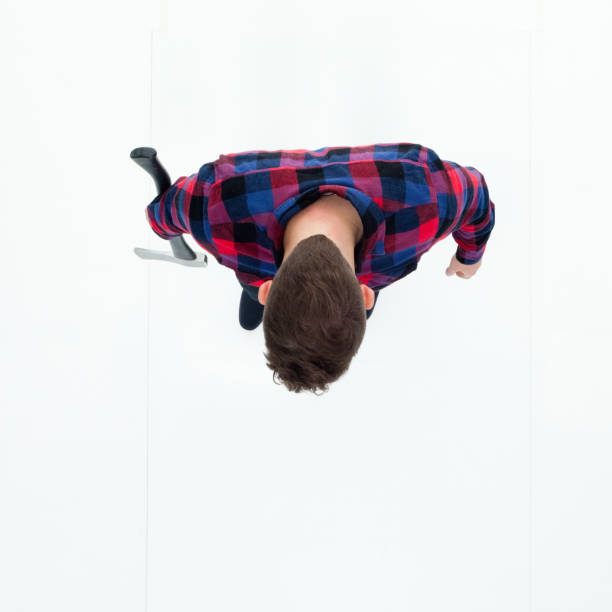 istock Top down view of man holding an axe 949775004