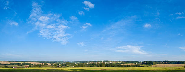 Big sky over green land  france village blue sky stock pictures, royalty-free photos & images